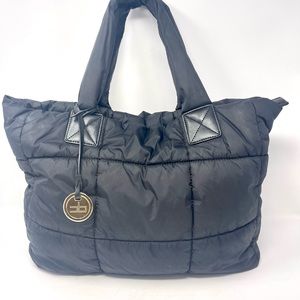 Courage b Puffy purse. Black.